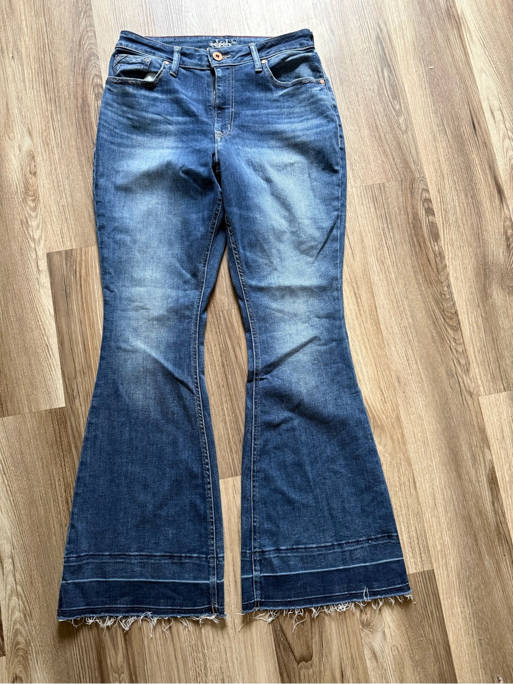 High-Rise Blue Flare Jeans with Raw Hem